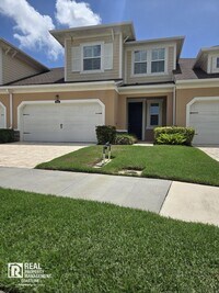 Building Photo - Impeccably Furnished Sarasota Oasis with Serene Water Views