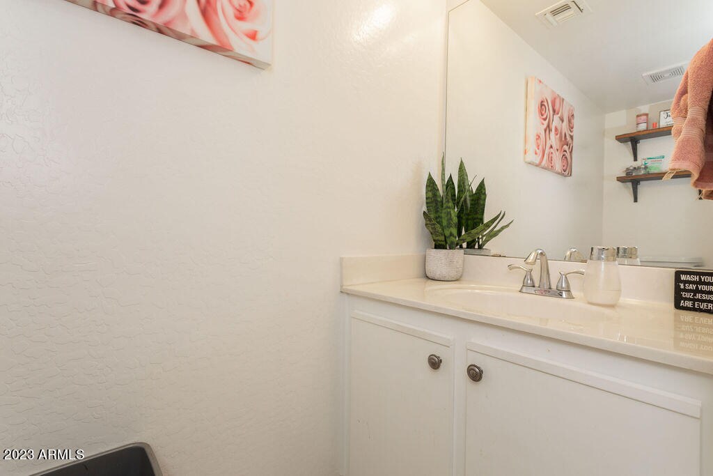 Main floor half bathroom - 455 S Mesa Dr