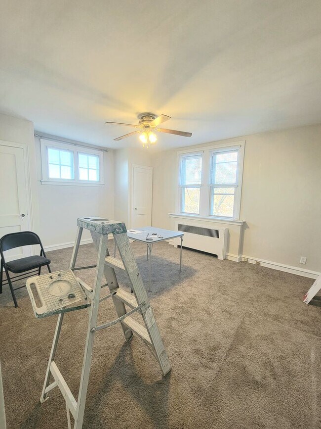 Building Photo - Stunning 4-Bedroom Townhome with Finished ...