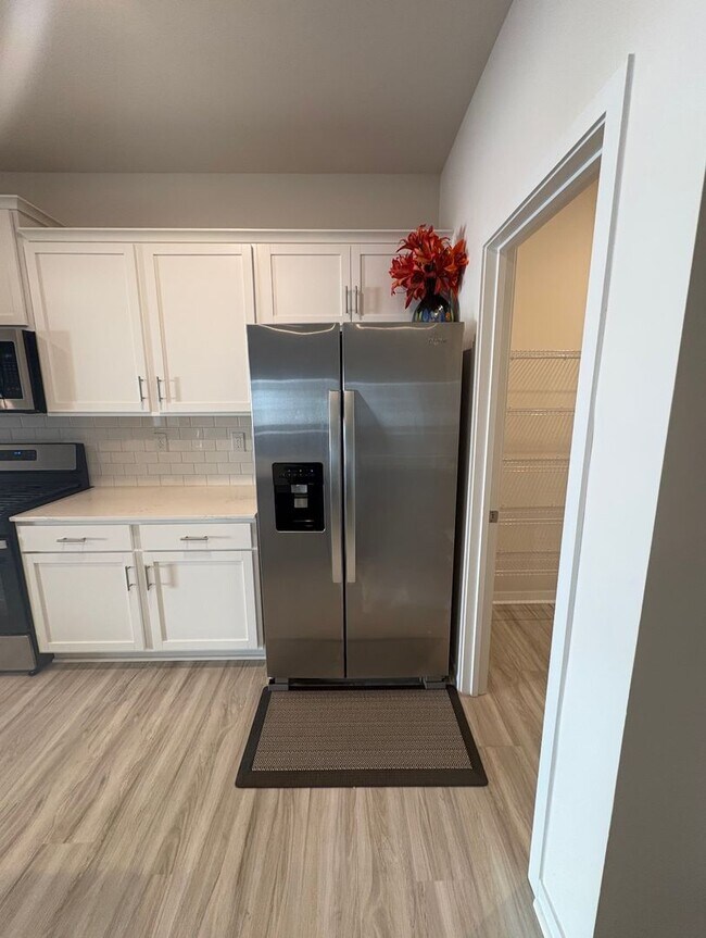 Building Photo - BRAND NEW TOWNHOME w/ Garage Parking