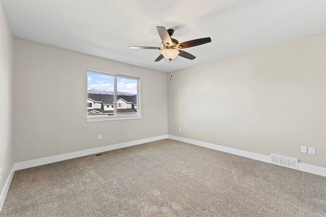 Building Photo - Upgraded 4-Bed Townhome with Finished Base...