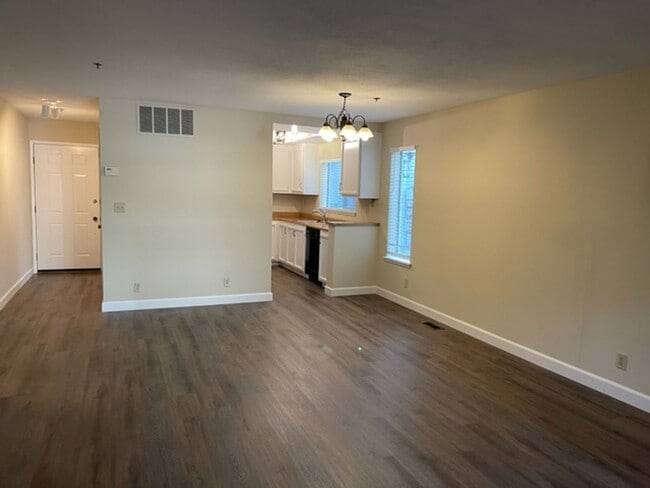 Building Photo - Wonderful lower level Condo with Laminate ...