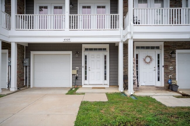 Building Photo - Your Next Home: Modern 3-Level Townhome with Garage, Deck & Huge Flex Space