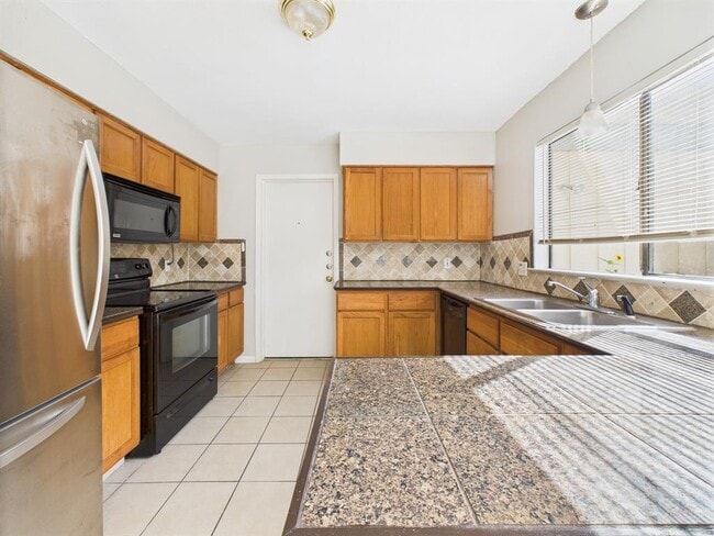 Building Photo - 9520 Quail Village Ln