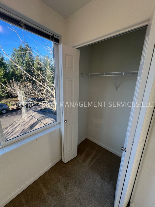 Building Photo - Beautiful Three Story Townhouse with Gas Fireplace, Balcony & 2-Car Garage