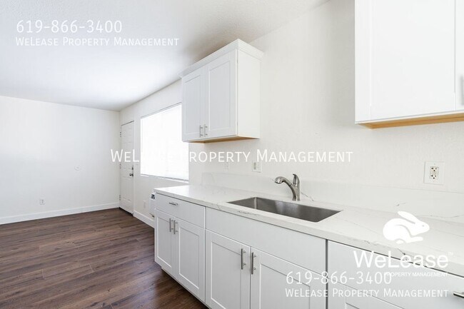 Building Photo - 3965 Logan Ave