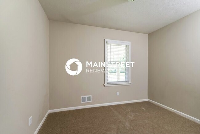 Building Photo - 8003 Canna Dr