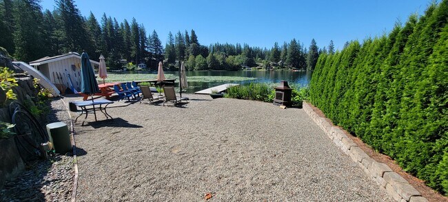 Building Photo - Lake Retreat Waterfront Living | Spacious Home with Views + Utilities Included