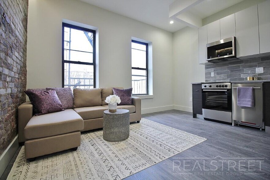 Building Photo - Stunning New 2 Bed in Crown Heights with Lounge & Backyard!