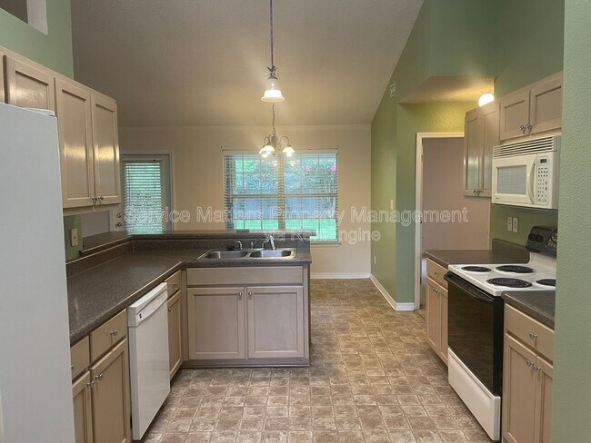 Building Photo - 6940 Hardwood Ct