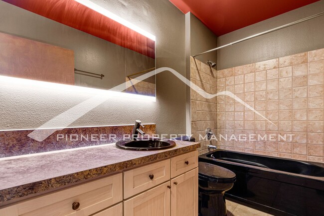 Building Photo - Modern Industrial Condo Downtown with Park...