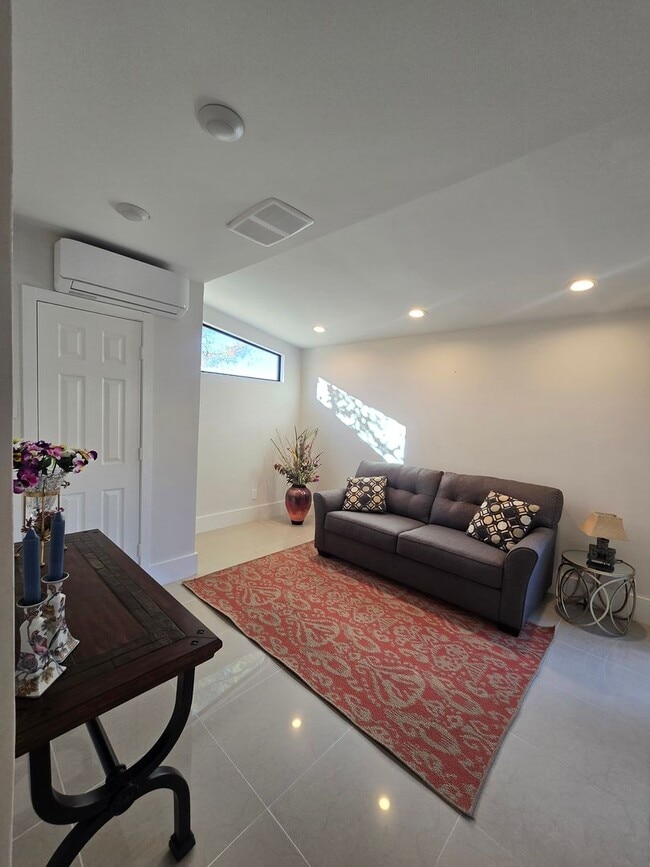 Building Photo - Furnished, 1-Year Long-Term Rental