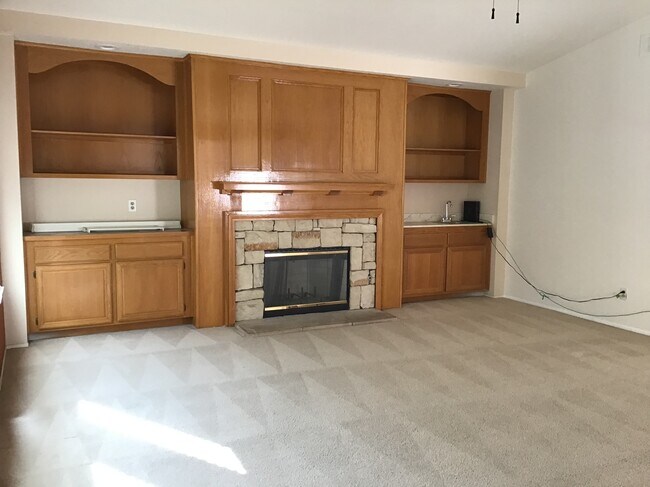 Upstairs loft offers fireplace, built-ins, bar - 20111 Cavern Ct