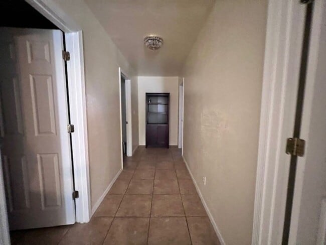 Building Photo - 3 Br 2Ba House with Garage and fenced yard**FURNISHED**