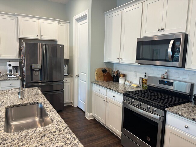 Building Photo - Spacious 4BR Townhome in Mount Pleasant | 2-Car Garage | Built 2020 | 2200 Sq Ft
