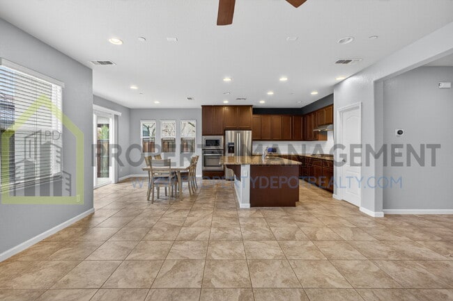 Building Photo - Spacious Elegance Awaits: 4-Bedroom Home with Hardwood Floors in Elk Grove!