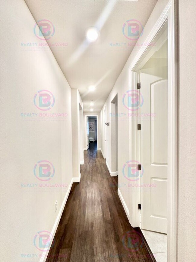 Building Photo - Welcome to your dream home, where modern elegance meets unparalleled convenience!