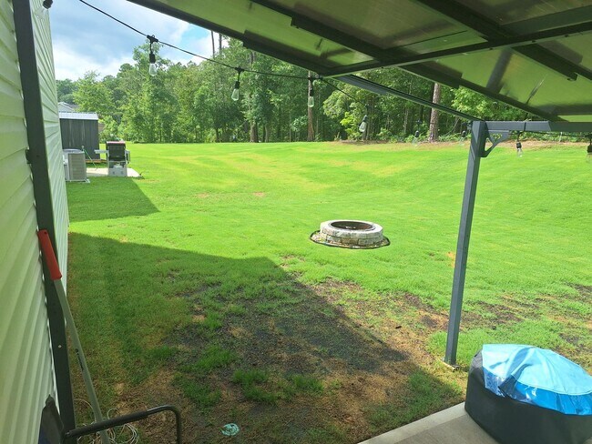 Building Photo - MOVE IN SPECIAL! Outstanding Four Bedroom ...
