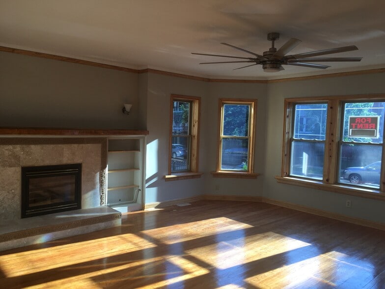 Living room/Fireplace - 7619 S Phillips Ave