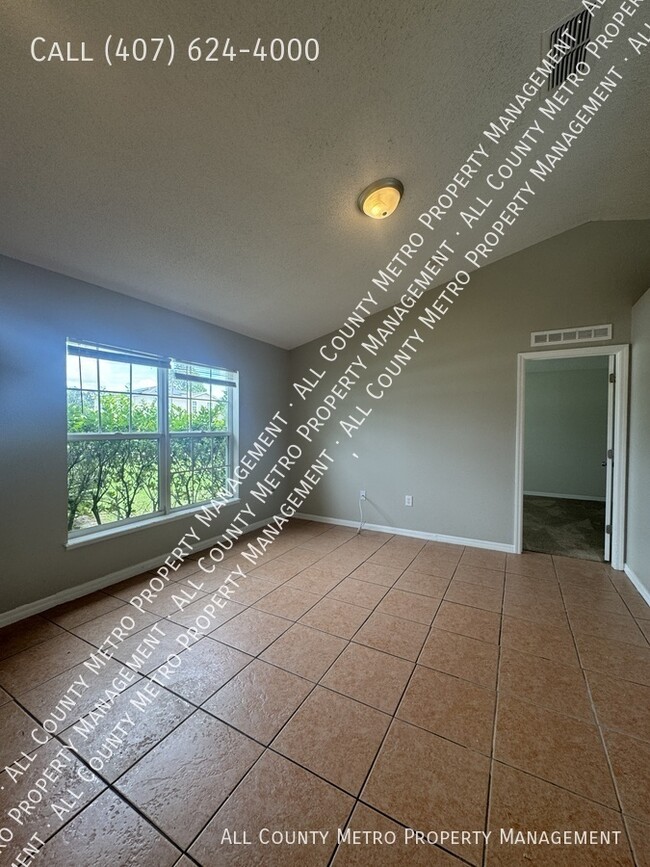 Building Photo - 3 Bedroom Poinciana Gem!