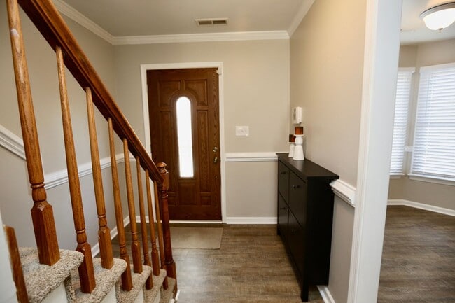 Building Photo - Updated End-Unit Brick Townhome Ready NOW!...