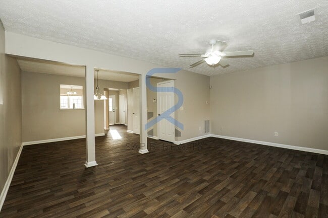 Building Photo - Move in before February 15th and choose your reward: a $250 Amazon Gift Card or a 55" Smart TV!