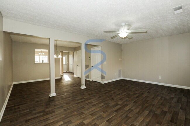 Building Photo - Move in before February 28th and choose your reward: a $250 Amazon Gift Card or a 55" Smart TV!