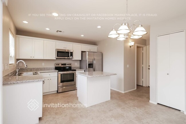Building Photo - 42575 W Sunland Dr