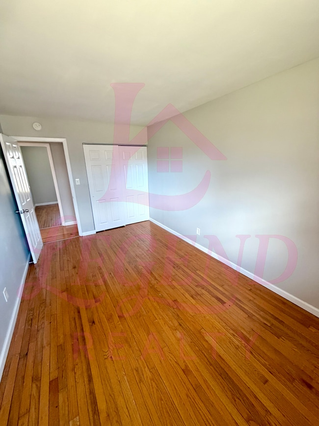 Building Photo - Spacious 4-Bedroom Home with Private Primary Suite & Hardwood Floors!