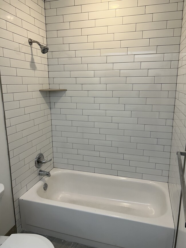 Tiled tub and shower - 24 Kings Ct