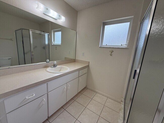 Building Photo - On Top of the World – Spacious Home in Premier 55+ Gated Community!