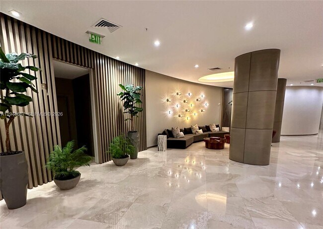 Building Photo - 10275 Collins Ave