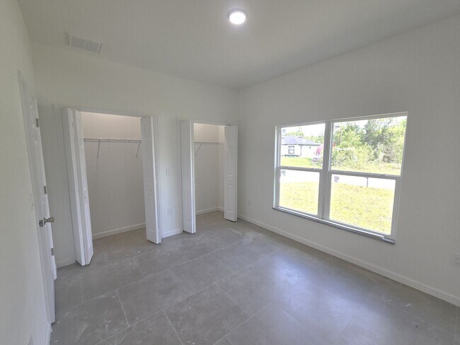 Building Photo - Brand New 2/2/1-South Lehigh Acres