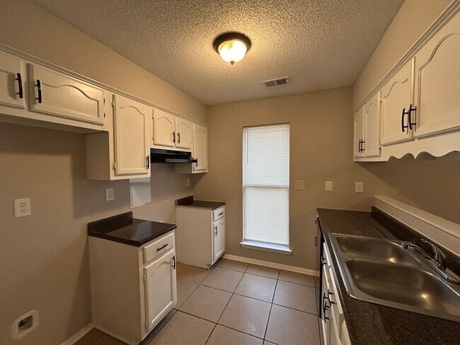 Building Photo - 7080 Benji Ave