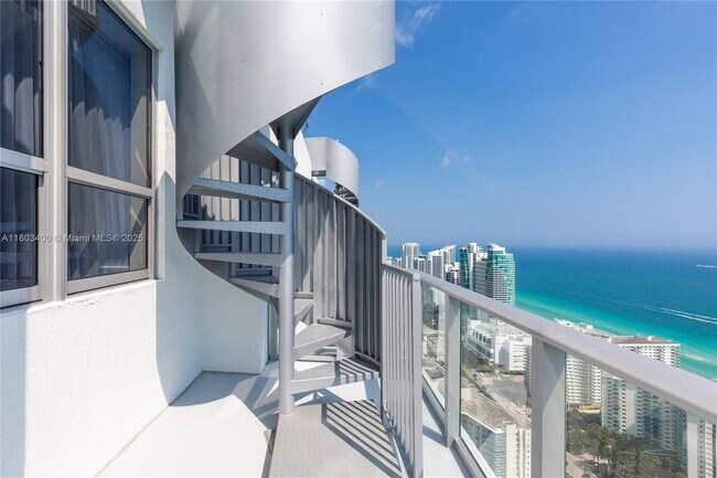 Building Photo - 4010 S Ocean Dr