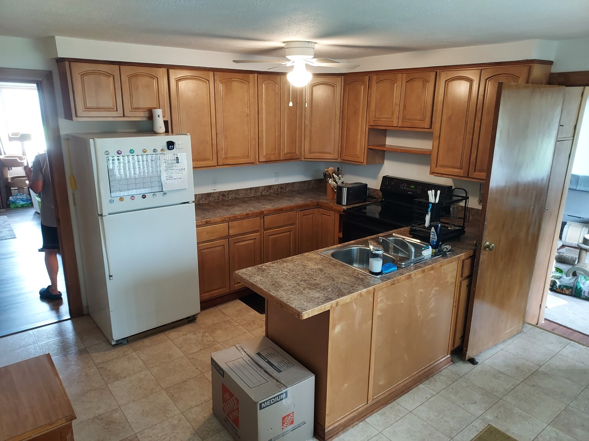 Kitchen with the BONUS large office off the back. Also, large windows throughout the office and kitc - 1145 Cleveland Dr