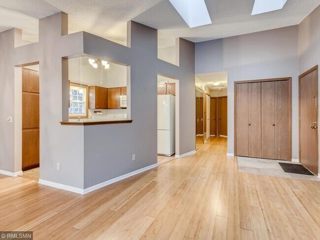 Vaulted ceilings and skylights make the space feel large and open - 7301 W 109th St