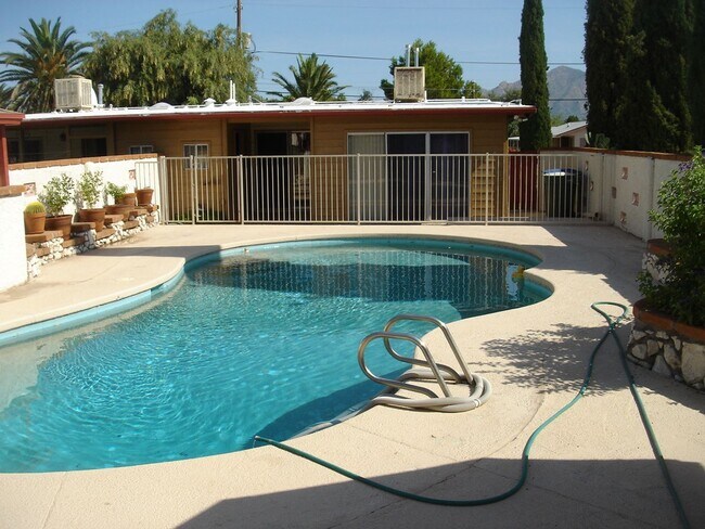 Building Photo - Available March 1, 2026. Updated 2 Bedroom 1.5 Bath Duplex with private dedicated pool.