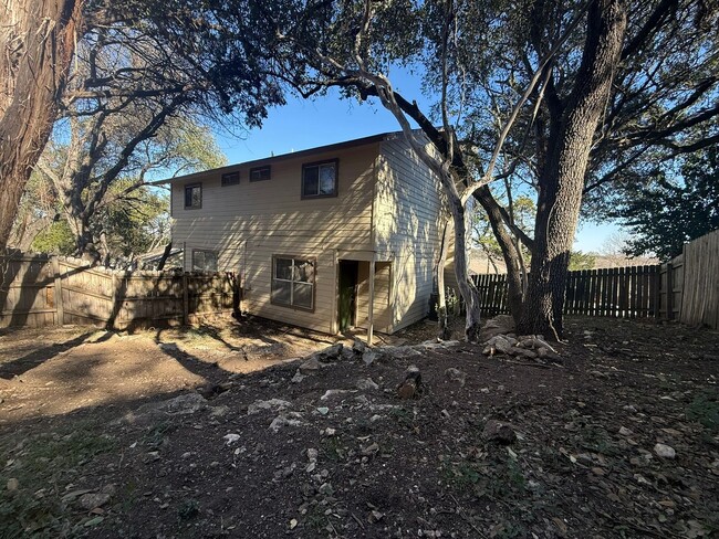 Building Photo - Wood Properties1 (8102 Dunn St)