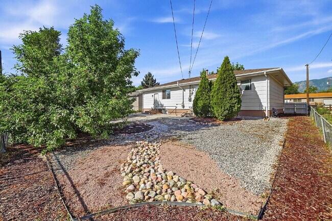 Building Photo - $2,345.95, 5-bed, 2.5-bathroom located in Colorado Springs with a fenced backyard.