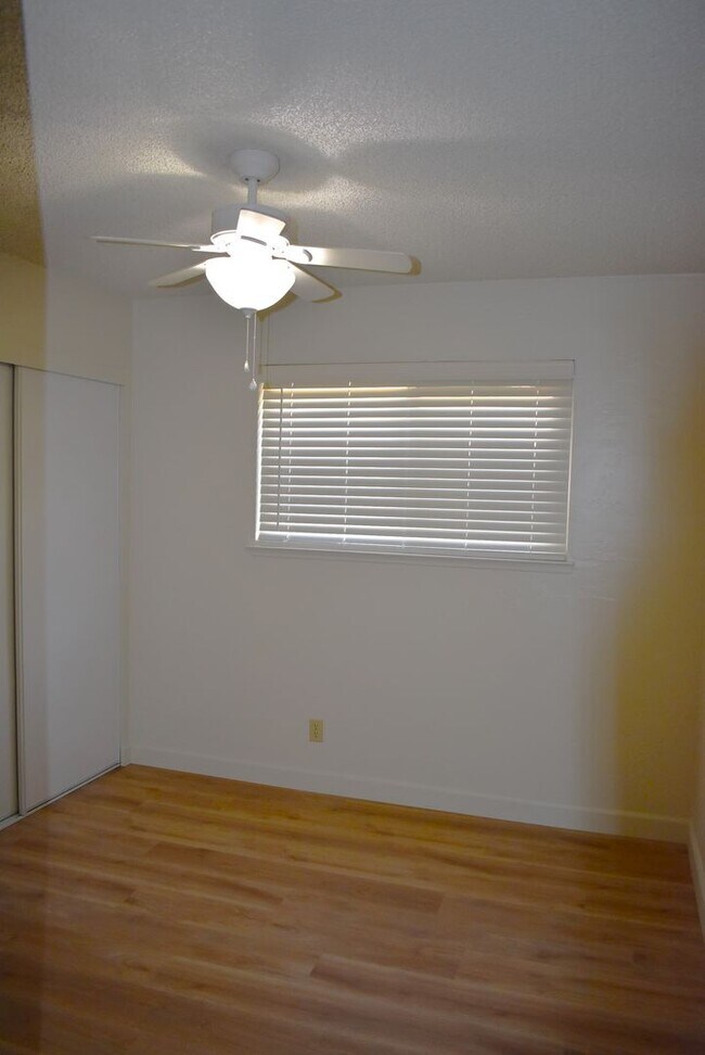 Building Photo - 4-bedroom home with luxury vinyl flooring and much more!