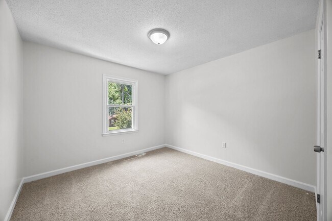 Building Photo - Fantastic Corner Lot, Updated 4 Bedroom Sp...