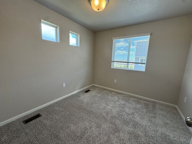 Building Photo - Modern 3-Level Home with Dual Balconies, Open Floor Plan & Bonus Flex Space