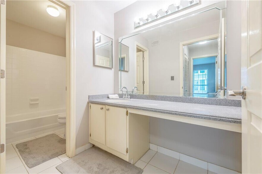 Bathroom with tub - 305 Granville Ct