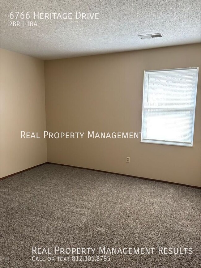 Building Photo - 6766 Heritage Dr