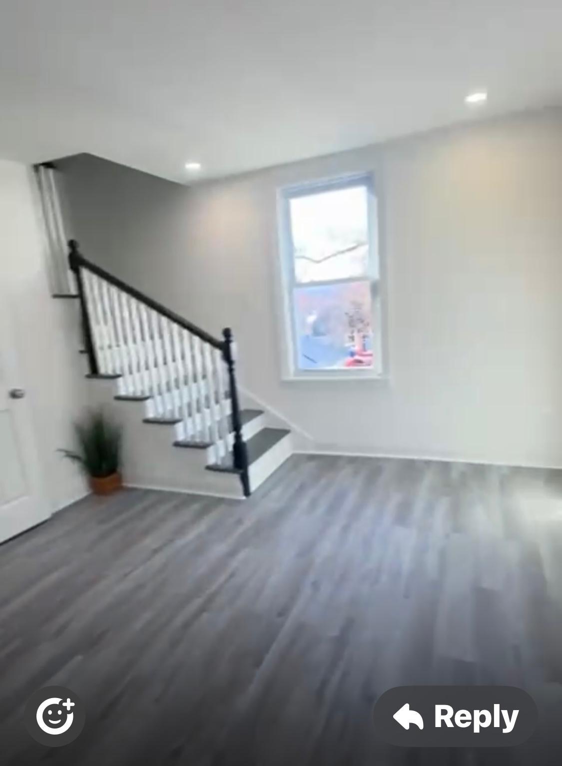 Living room and staircase to upfloor - 384 Sylvan Ave