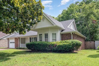 Building Photo - Charming 2-Bedroom Home with Sunroom in th...