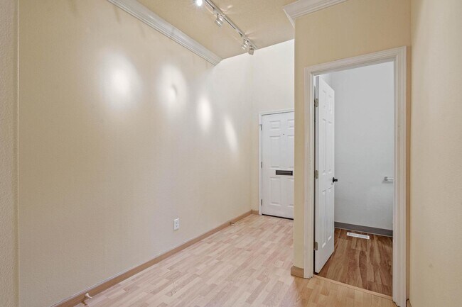 Building Photo - $500 move-in special! Unique 2-bdrm/2.5-bath duplex w/ A/C—Private patio, storage, garage w/ wash...