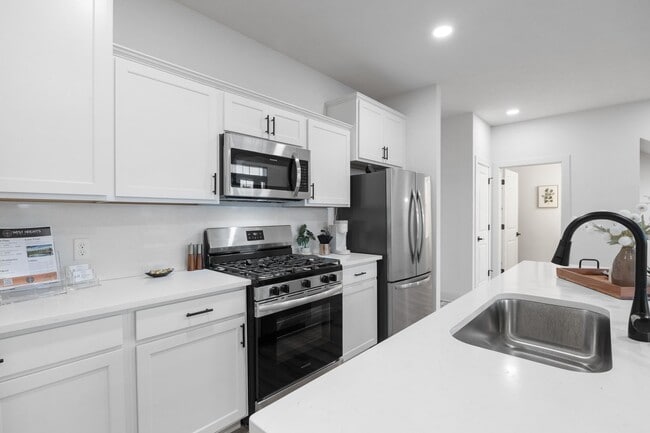 Building Photo - Brand New Three Bedroom Townhome in West L...