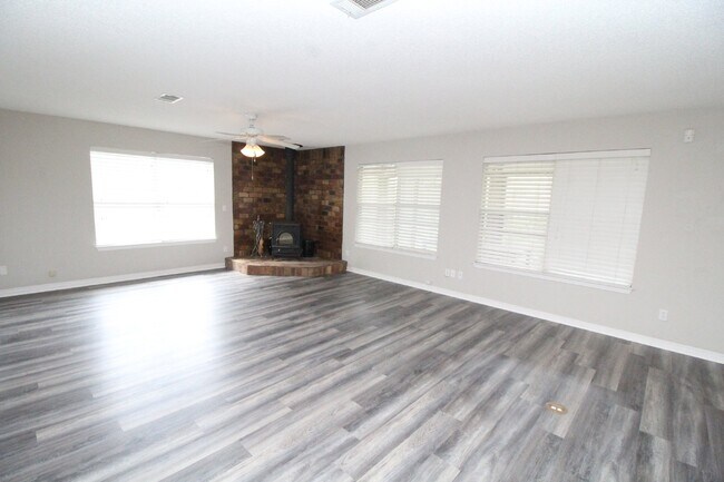 Building Photo - Live the Gulf Breeze Waterfront Life – Dock, Canal Access & Boat Lift!